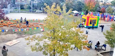 rooftop photo of school yard during Garden Pumpkin Patch